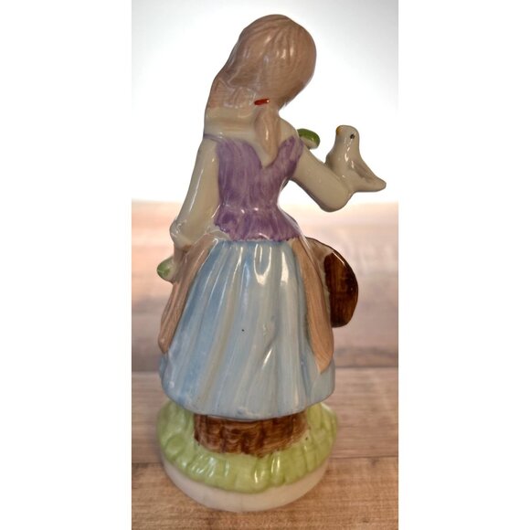 Vintage Hand-Painted Ceramic Figurine Girl Holding Bird Floral Accents Country C - Picture 3 of 4